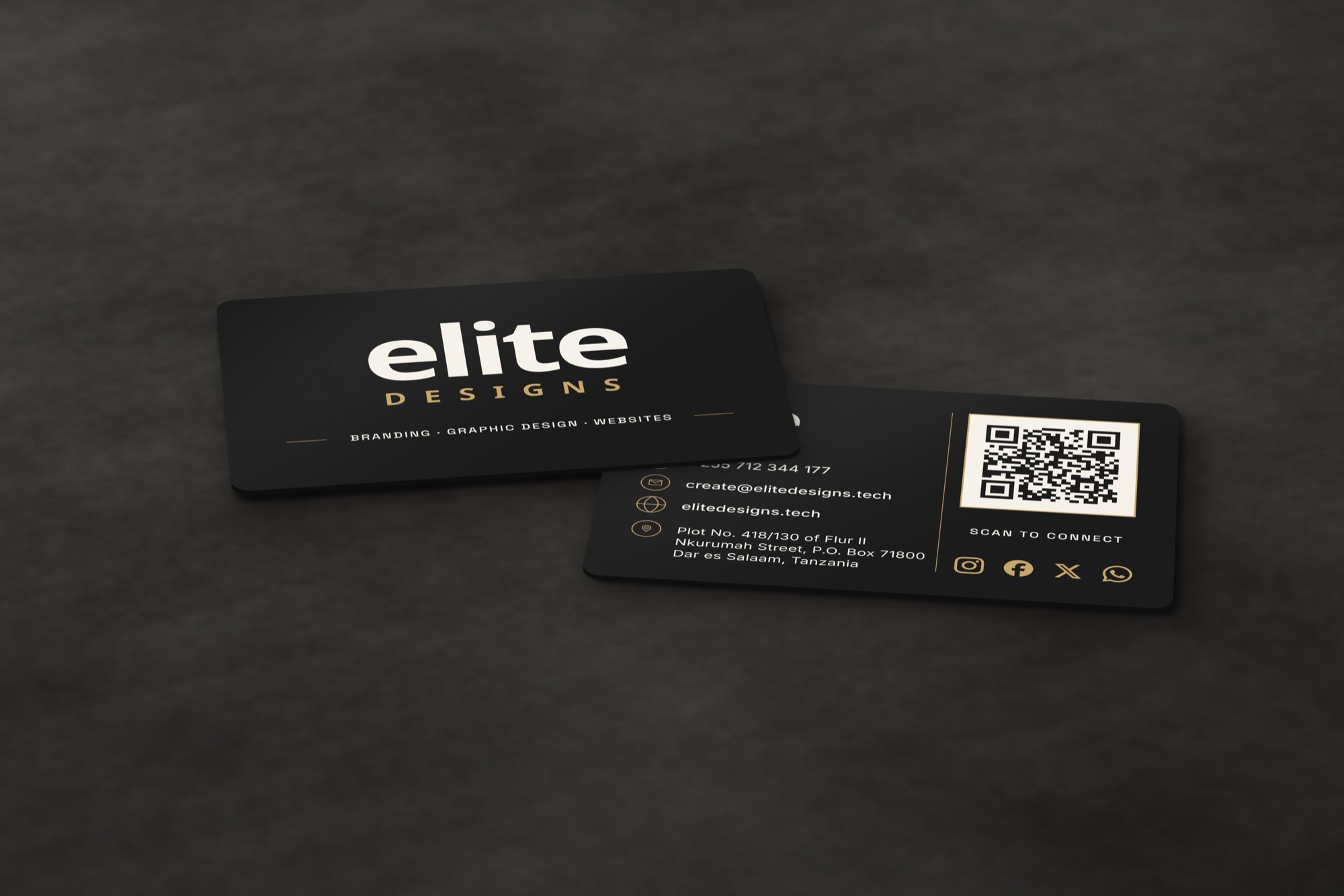 The charcoal business card, front and back, showing contact details and a QR code.